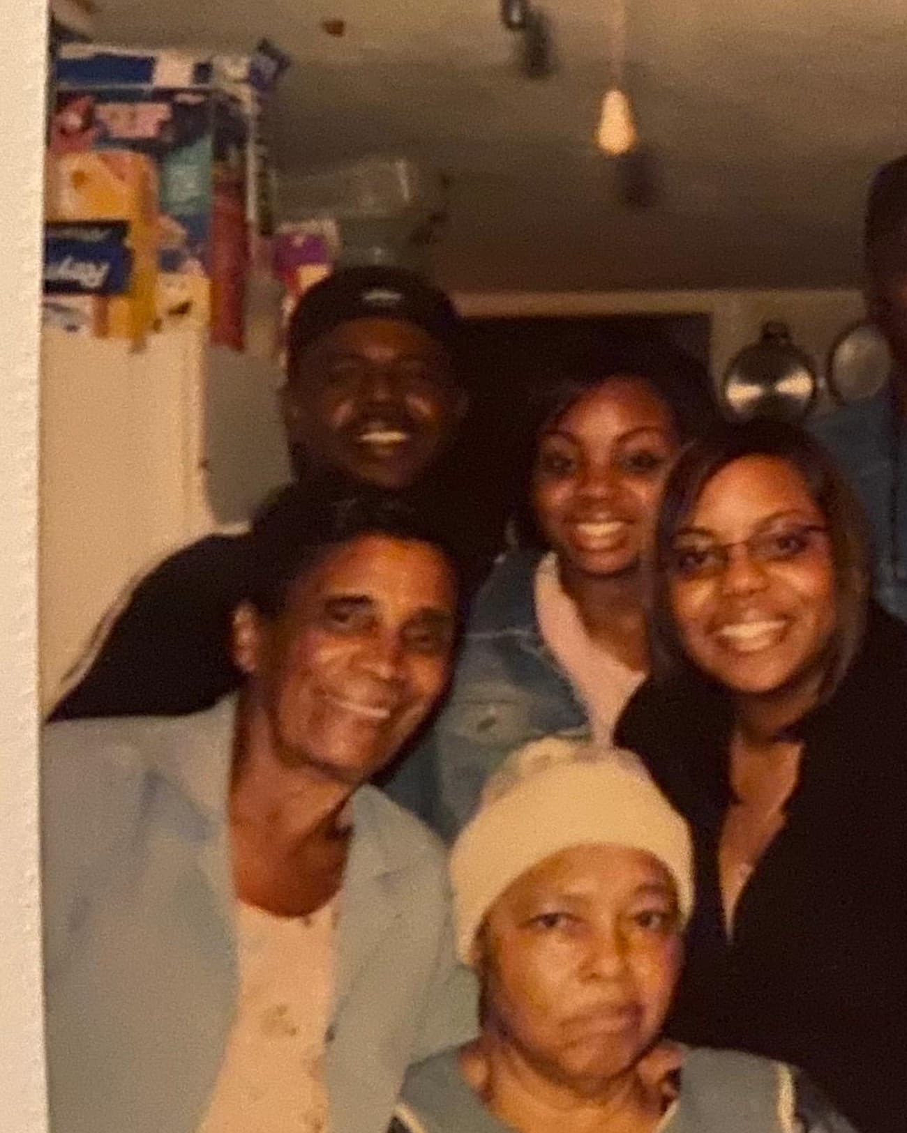 Josie’s grandmother with members of the Smith family gathered inside the family home.